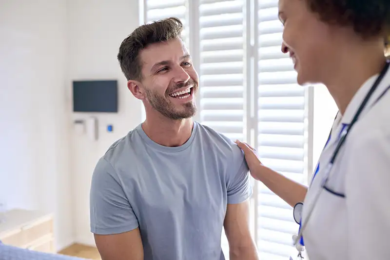 female-nurse-wearing-uniform-meeting-with-male-pat